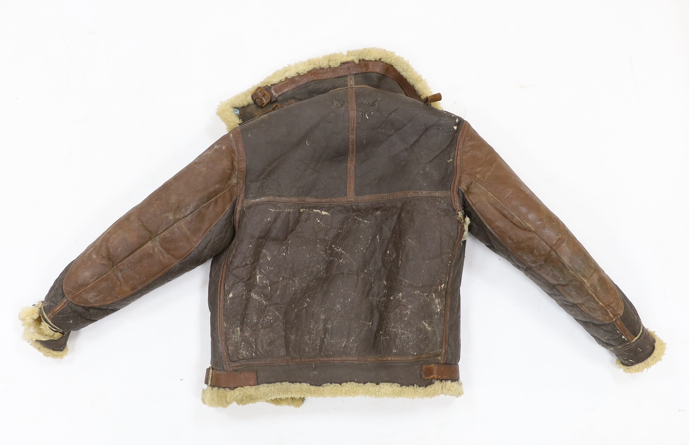 A United States Air Force Type B-3 sheepskin flying jacket, with label to collar reading; ‘Type B-3 DWG. No.33H5595 AC Order No.43-13609-AF Size 38R Property Air Force U.S. Army’